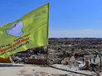 bendera-pasukan-demokratik-suriah-sdf-dibentangkan-di-baghouz.jpg