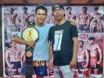billy-pasulatan-juara-mma-asal-minahasa-utara-ingin-rebut-gelar-juara-kelas-berbeda.jpg