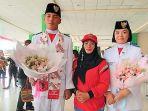 breaking-news-2-anggota-paskibraka-asal-sulut-initiba-di-bandara-sam-ratulangi-manado.jpg