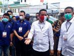 calon-bupati-boltim-sam-sachrul-mamonto-dan-wakil-bupati-oskar-manoppo.jpg