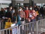 calon-penumpang-pesawat-di-terminal-1-bandara-soekarno-hatta-3467347.jpg