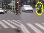 coba-perhatikan-reaksi-orang-sekitar-saat-emakiniterobos-lampu-merah-nyaris-tertabrak_20180524_164320.jpg