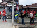 dpc-pdip-bitung-lakukan-penyemprotan-disinfektan-2.jpg