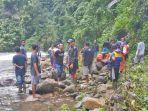 empat-orang-hanyut-di-sungai-milangodaa-utara.jpg