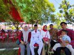erik-saat-berfoto-bersama-keluarganya-hfhgf658658.jpg