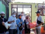 gelar-reses-amir-liputo-serahkan-bantuan-ke-korban-kebakaran-di-kampar.jpg