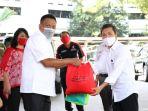 gubernur-olly-bantu-para-buruh.jpg