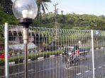 hujan-yang-turun-saat-matahari-bersinar-di-siang-hari-sabtu-7122019-di-jalan-aa-maramis-237.jpg
