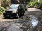 jalan-lingkar-danau-tondano-rusak-parah.jpg