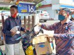 jemaat-advent-tikala-bagikan-makan-siang-untuk-tukang-ojek-12.jpg