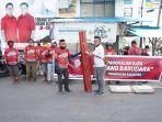 jg-kwl-yang-menyumbangkan-material-renovasi-pangkalan-ojek.jpg