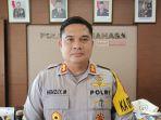 kapolres-minahasa-akbp-henzly-moningkey-saat-dikonfirmasi-rabu-1312021.jpg