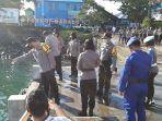 kapolresta-manado-pimpin-upacara-tabur-bunga-di-laut.jpg