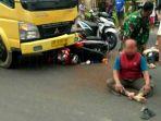 kecelakaan-di-bantul-pengendara-motor-tertabrak-truk-kaki-patah-hingga-masuk-kolong-truk.jpg