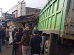 kecelakaan-maut-di-tanjungsari-sumedang-truk-tabrak-kendaraan-dan-ruko-satu-orang-tewas.jpg