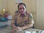 kepala-dinas-kependudukan-dan-catatan-sipil-kabupatenhjhgjhj.jpg