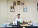 kepala-disdikpora-minsel-dr-fitber-raco-56467.jpg