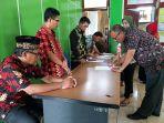 kepala-madrasah-kemenag-se-bolmong-tandatangani-pakta-integritas.jpg