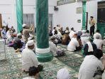komunitas-pejuang-suling-subuh-keliling-manado.jpg