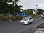 kondisi-jalanan-di-jalan-a-a-maramis-depan-kantor-tribun-manado-selasa-22122020.jpg