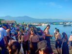 manado-beach-cleanup-campaign-ais-forum-2019.jpg