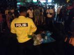 manusia-silver-tewas-terlindas-truk-di-jalan-ringroad-medan.jpg
