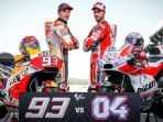 marc-marquez-dan-andrea-dovizioso_20181018_191251.jpg