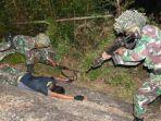 oknum-kkb-disergap-pasukan-yonif-5-marinir-situbondo-simulasikan-skenario-strategi-penangkapan.jpg