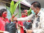 olly-dondokambey-gubernur-sulut-menyerahkan-600-cikal-bibit-kelapa.jpg