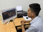 pantau-saham_20180731_004921.jpg