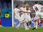 pemain-italia-melakukan-selebrasi-235634.jpg