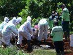 pemakaman-jenazah-meninggal-karena-covid-19-1.jpg