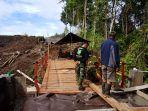 pembangunan-tmmd-di-desa-tempang-tiga-minahasa-hampir-selesai-ini-buktinya.jpg