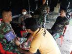 pemeriksaan-kesehatan-para-personel-yang-melakukan-pengamanan-gunung-karangetang.jpg