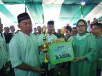 pemerintah-kelurahan-motoboi-kecil-sebagai-pemenang-pesona-monuntul-kota-kotamobagu-2019.jpg