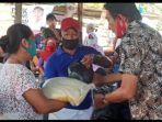 penyerahan-bantuan-pangan-atau-sembako-dari-ysn-minaesa.jpg