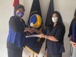 penyerahan-sk-plt-ketua-garda-wanita-garnita-malahayati-nasdem-sulut.jpg