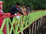peringati-hari-pahlawan-bupati-dan-semua-opd-bolsel-tabur-bunga-di-dudepo.jpg