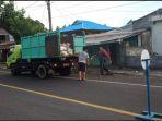 permasalahan-sampah-yang-mulai-teratasi-dengan-beroperasinya-truk-pengangkut-sampah.jpg