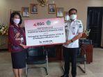 pimcab-bsg-airmadidi-yolanda-manoppo-menyerahkan-simbolis-bantuan-tanggung-jawab-sosial.jpg