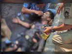 polisi-terbakar-saat-unjuk-rasa-mahasiswa-515.jpg