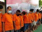 polisitangkap-pelaku-jual-beli-tes-swab-palsu-satu-tersangka-berusia-1-tahun.jpg