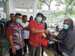 potong-2-ekor-sapi-bawaslu-bolsel-berbagi-daging-kurban-dengan-kaum-duafa.jpg