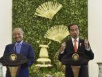 presiden-joko-widodo-kanan-bersama-perdana-menteri-malaysia-mahathir-mohamad.jpg