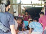 proses-evakuasi-korban-pembunuhan-di-tambang-tatelu-yang-dilakukan-polsek-dimembe.jpg