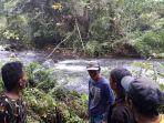 proses-pencarian-korban-yang-hanyut-di-sungai.jpg