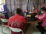 rapat-virtual-antara-pemkab-bolmong-dan-bp2mi-manado.jpg