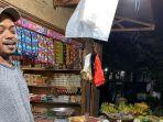 salah-satu-penjual-bahan-pokok-di-pasar-serasi-kotamobagu.jpg