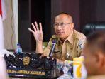 sekretaris-daerah-kabupaten-bolaang-mongondow-utara-dr-drs-hi-asripan-nani-msi.jpg