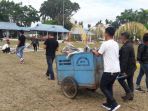 selesai-melakukan-salat-iduladha-pemuda-lintas-gereja-di-kotamobagu-lakukan-bersih-sampah_20180822_110242.jpg